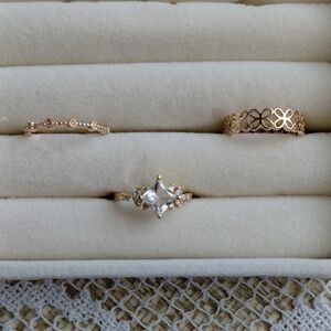Trio of Goldtone Rings with Crystal Accents - size 7